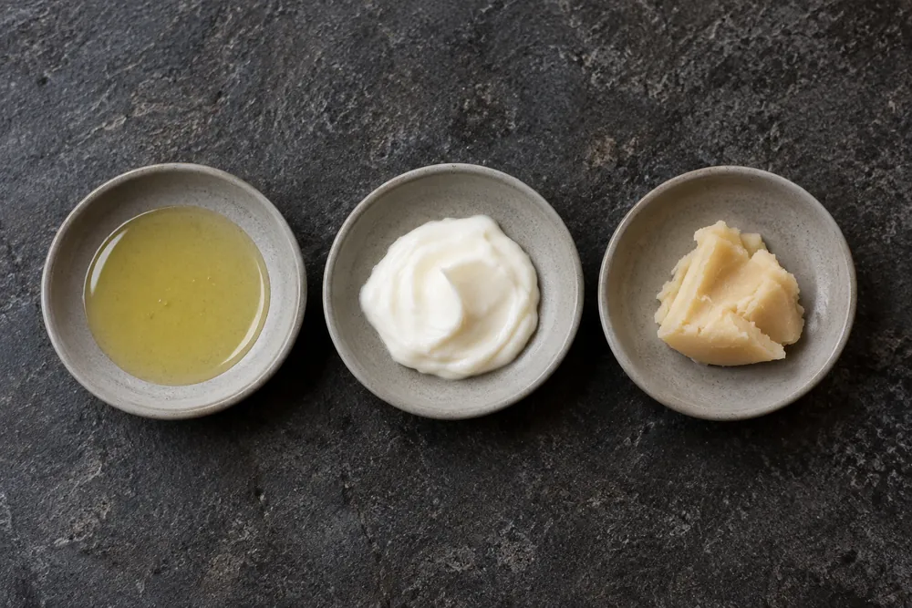 Muestras de aceite, crema y bálsamo para comparar texturas.